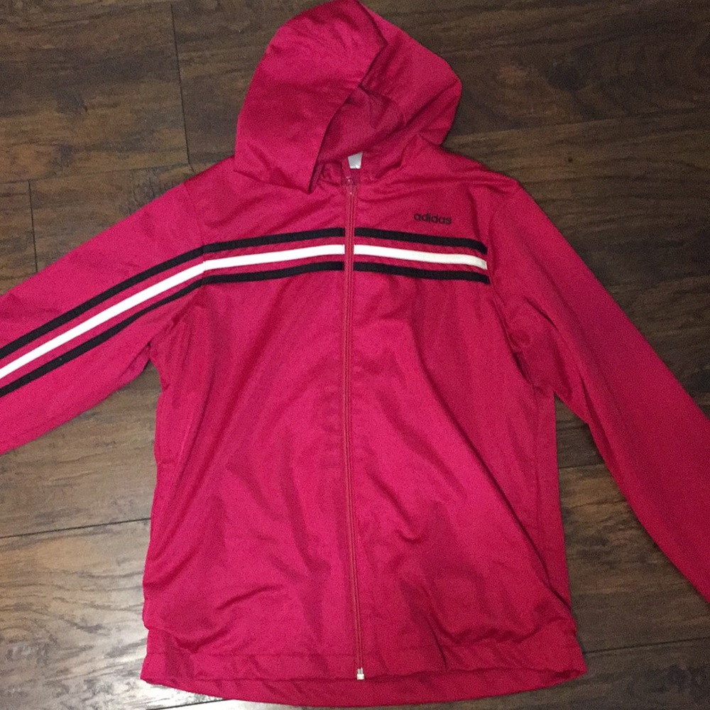 Pink adidas jacket with black and white stripe